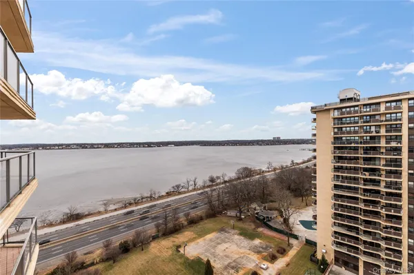 a view of a lake with a building in the back