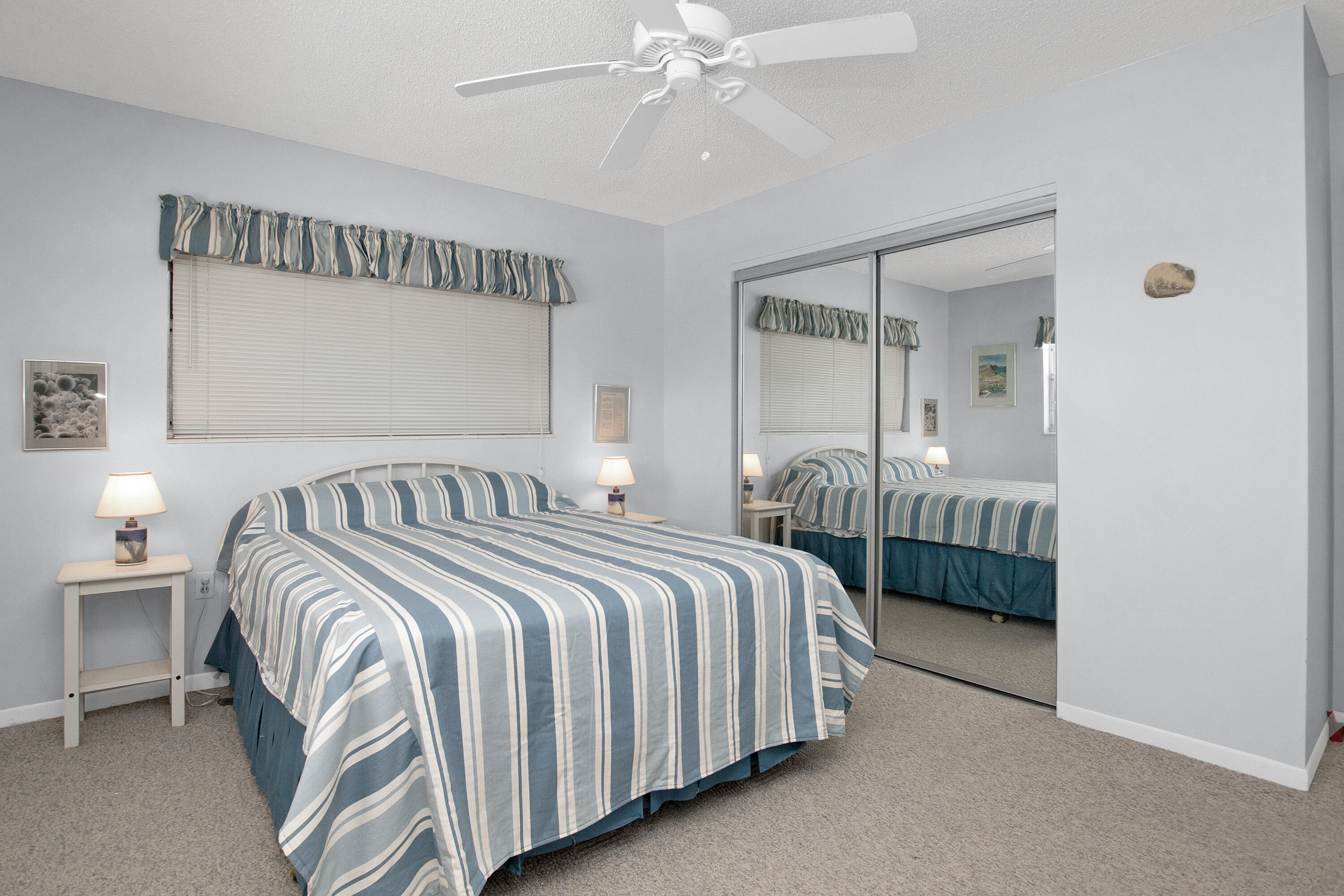 136 Brian Road Marathon, FL 33050 - Photo 12 of 19 a bedroom with a bed and a chandelier