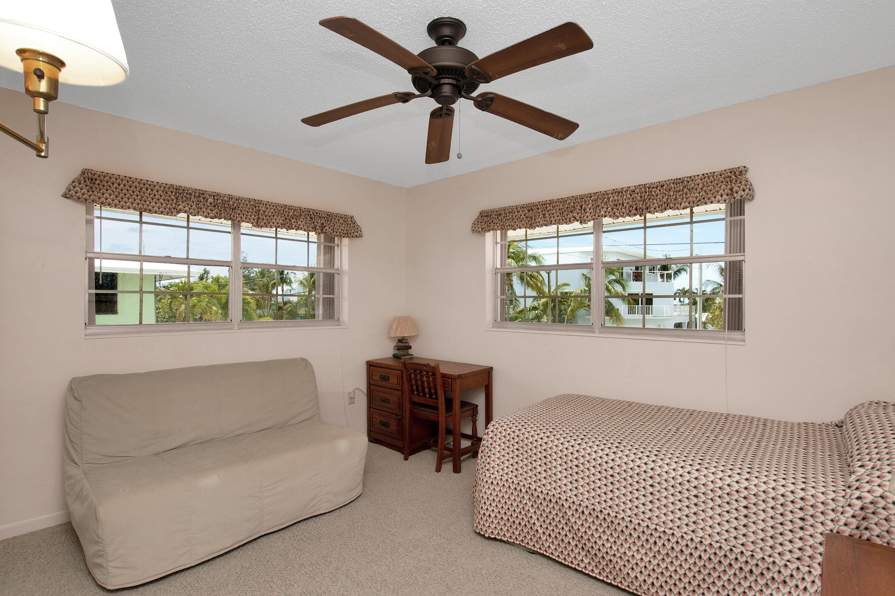 136 Brian Road Marathon, FL 33050 - Photo 15 of 19 a bedroom with a bed and a window