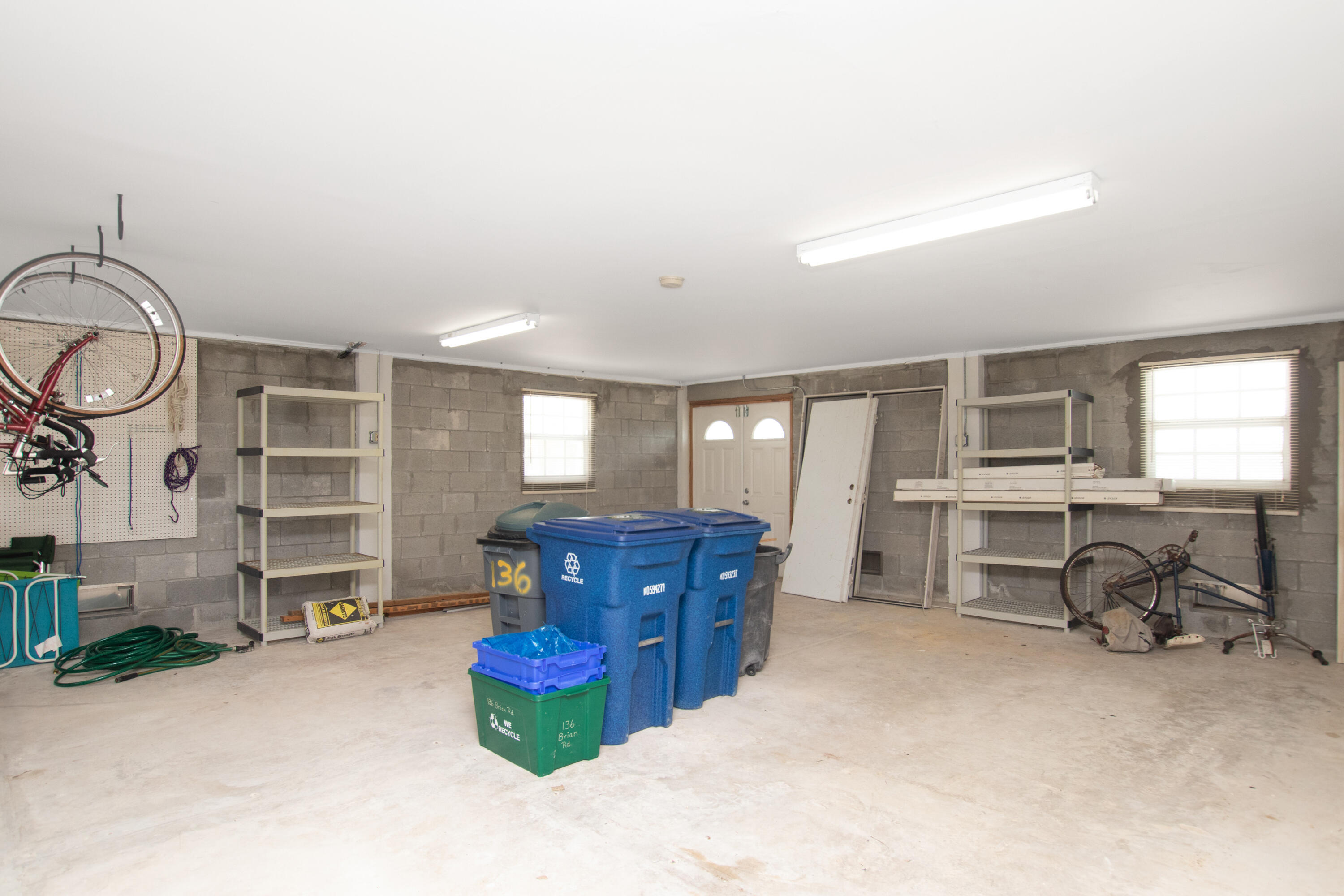 136 Brian Road Marathon, FL 33050 - Photo 19 of 19 a living room with furniture cabinets and a window