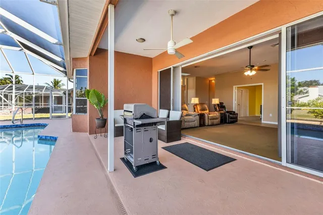 a lobby with furniture and floor to ceiling window