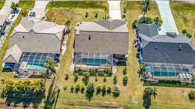 aerial view of a house with a swimming pool