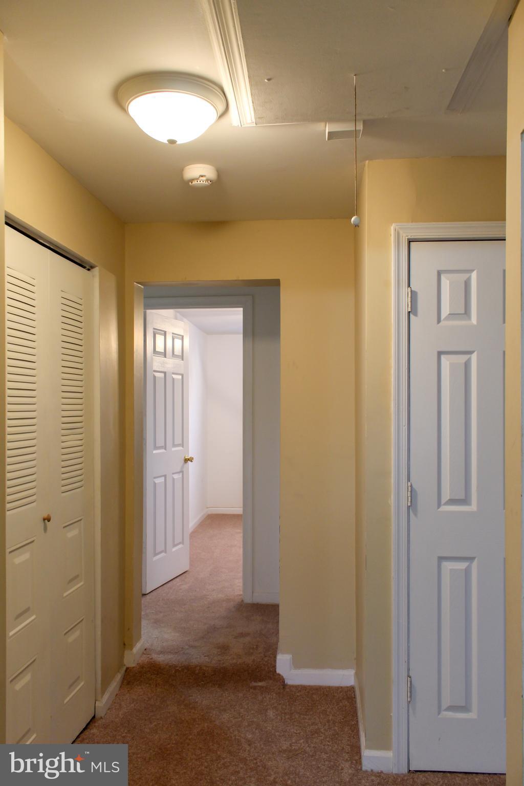 10801 Tippett Road Clinton, MD 20735 - Photo 8 of 17 Hallway to Bedrooms