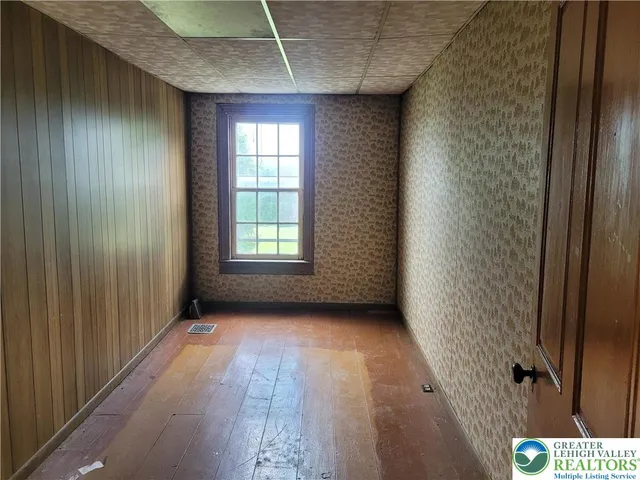 an empty room with windows
