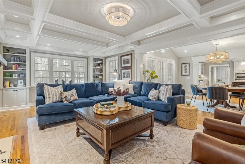 49 Hilltop Road Short Hills, NJ 07078 - Photo 12 of 34 a living room with furniture and a large window
