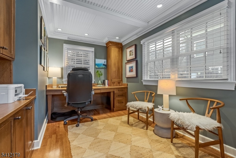 49 Hilltop Road Short Hills, NJ 07078 - Photo 15 of 34 a view of a workspace with furniture and a window