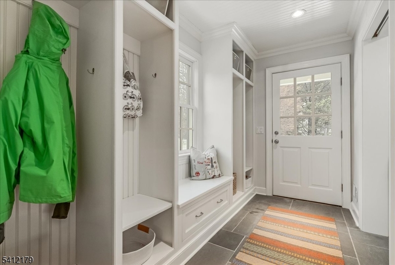49 Hilltop Road Short Hills, NJ 07078 - Photo 9 of 34 a bathroom with a bathtub and a shower