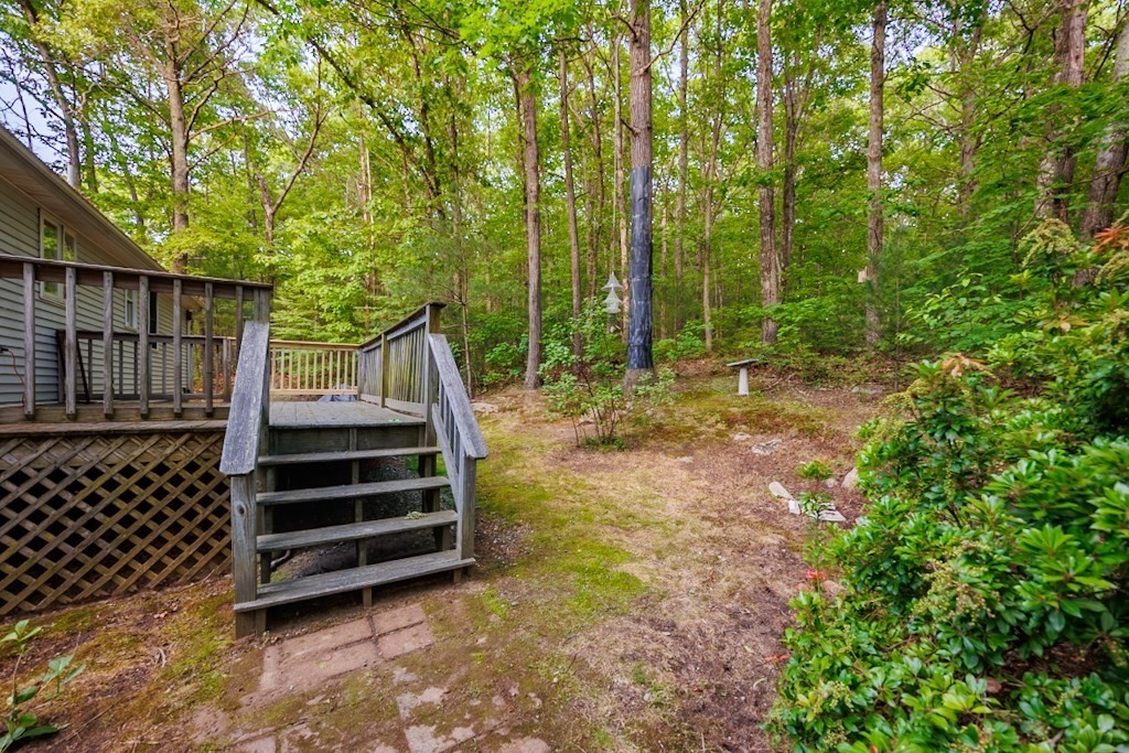571 Douglas Road Northbridge, MA 01588 - Photo 23 of 29 a backyard of a house with lots of green space