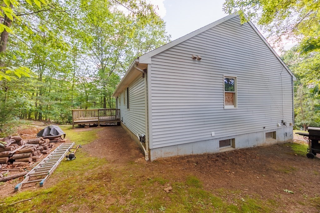 571 Douglas Road Northbridge, MA 01588 - Photo 24 of 29 a view of a back yard of the house