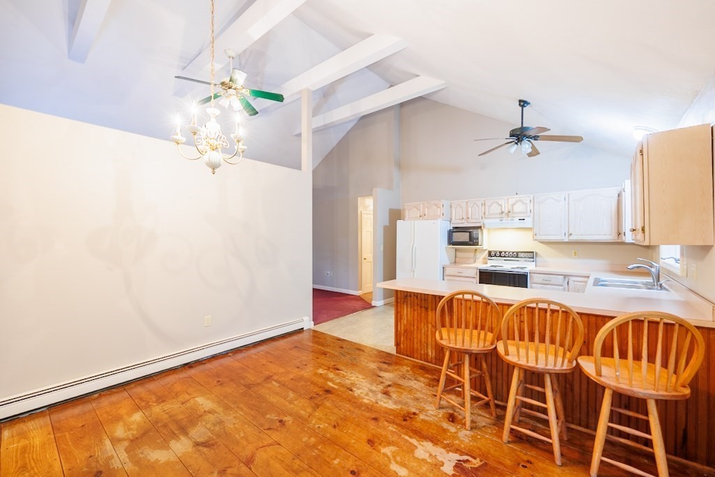 571 Douglas Road Northbridge, MA 01588 - Photo 9 of 29 a view of a dining room with furniture