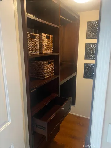 a bedroom with a bed and a fireplace