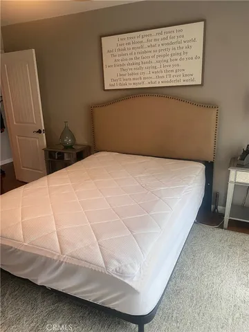 a view of a large body of water with lots of green space