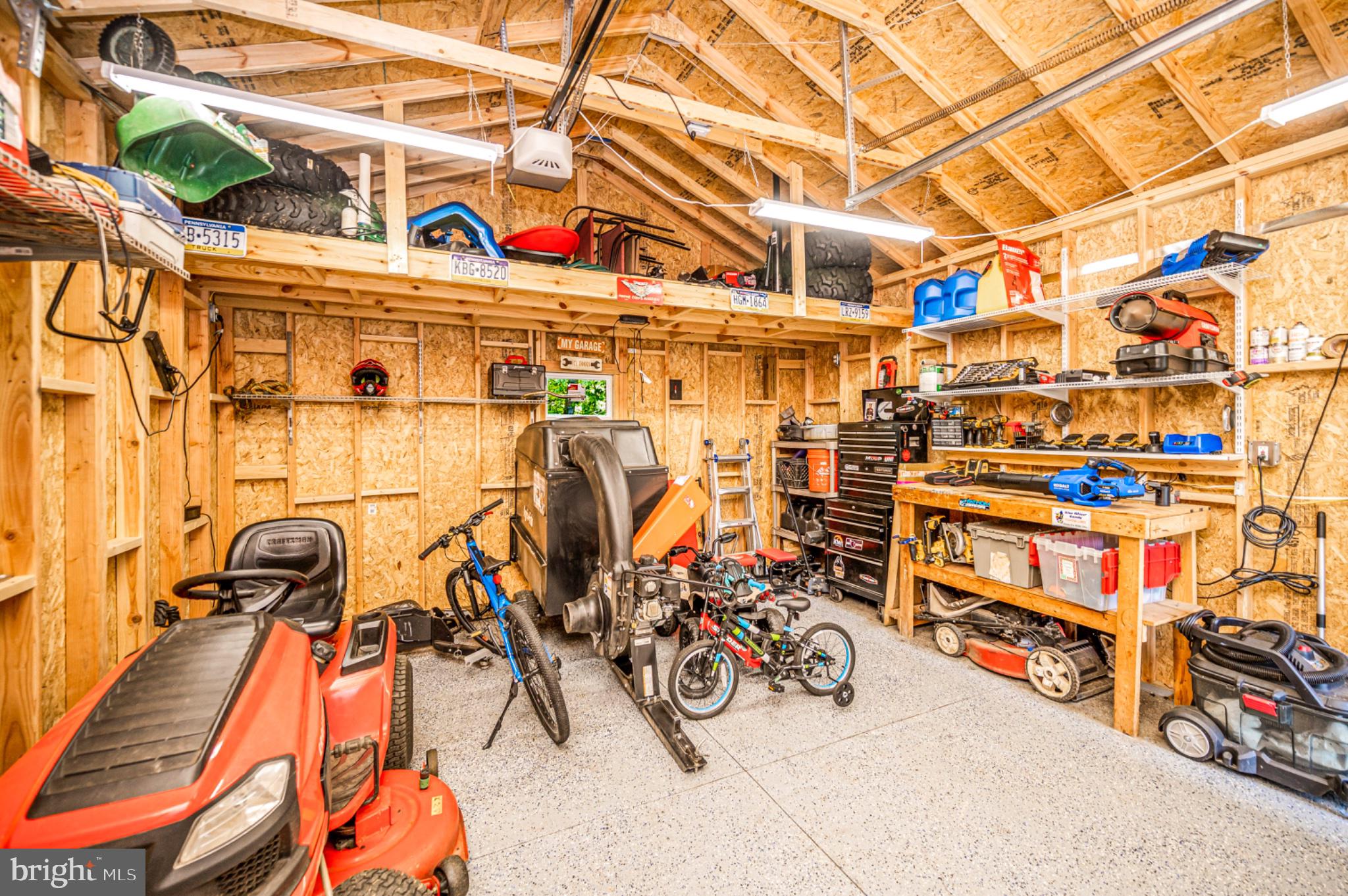 239 Toluca Road Stafford, VA 22556 - Photo 19 of 75 Organized garage for all your tools.