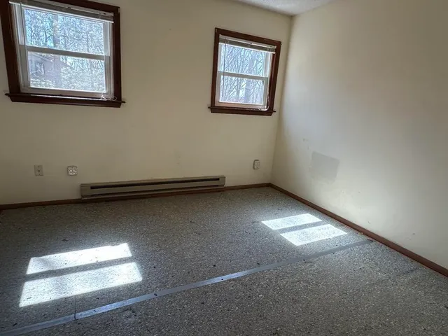 an empty room with a window