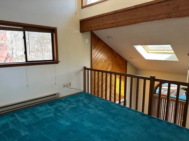 a view of hallway with stairs