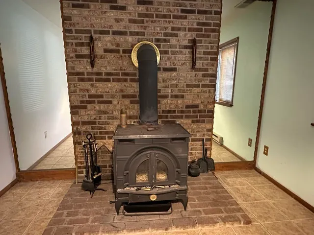 a bathroom with a toilet sink and shower