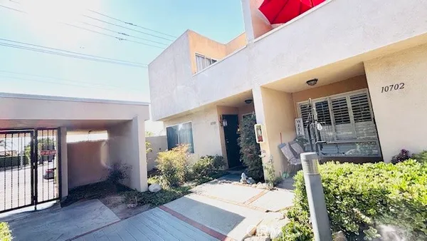 a house view with a outdoor space