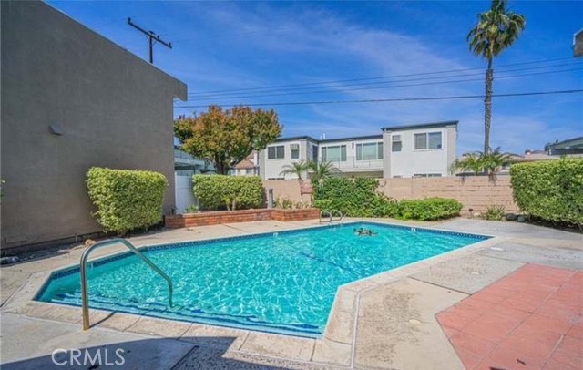 10700 Knott Avenue Stanton, CA 90680 - Photo 5 of 7 a front view of a house with garden