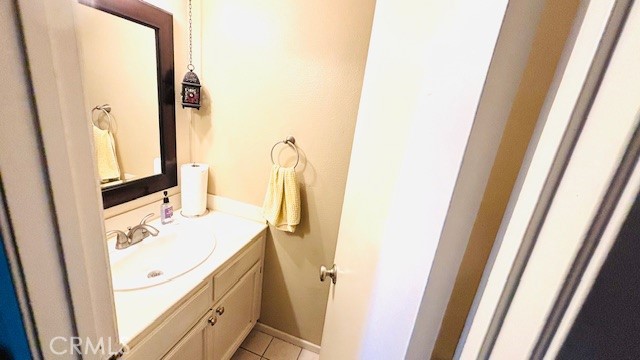 10700 Knott Avenue Stanton, CA 90680 - Photo 7 of 7 a bathroom with a sink vanity and a mirror