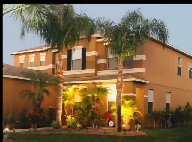 a view of a parking space with a garage