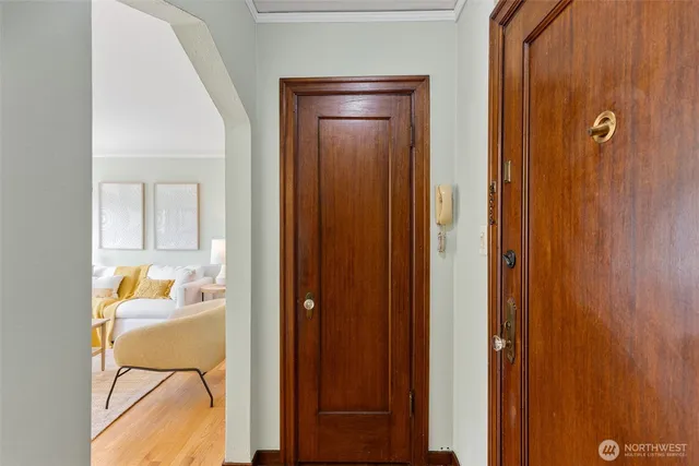 a bathroom with a tub shower and a sink