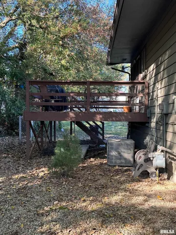 a view of house with outdoor seating