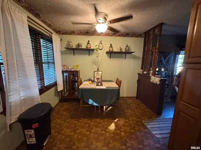 a room with furniture and a chandelier