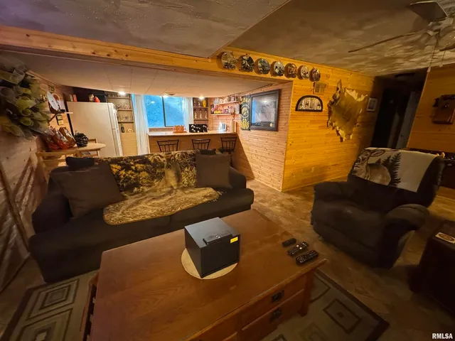 a living room with furniture and a table