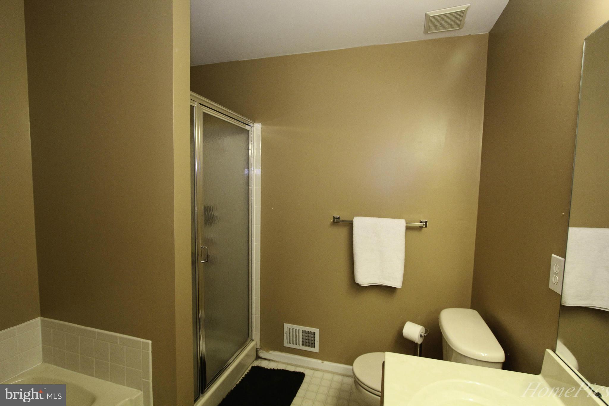 109 Limited Drive Ranson, WV 25438 - Photo 21 of 29 a bathroom with a shower and a sink