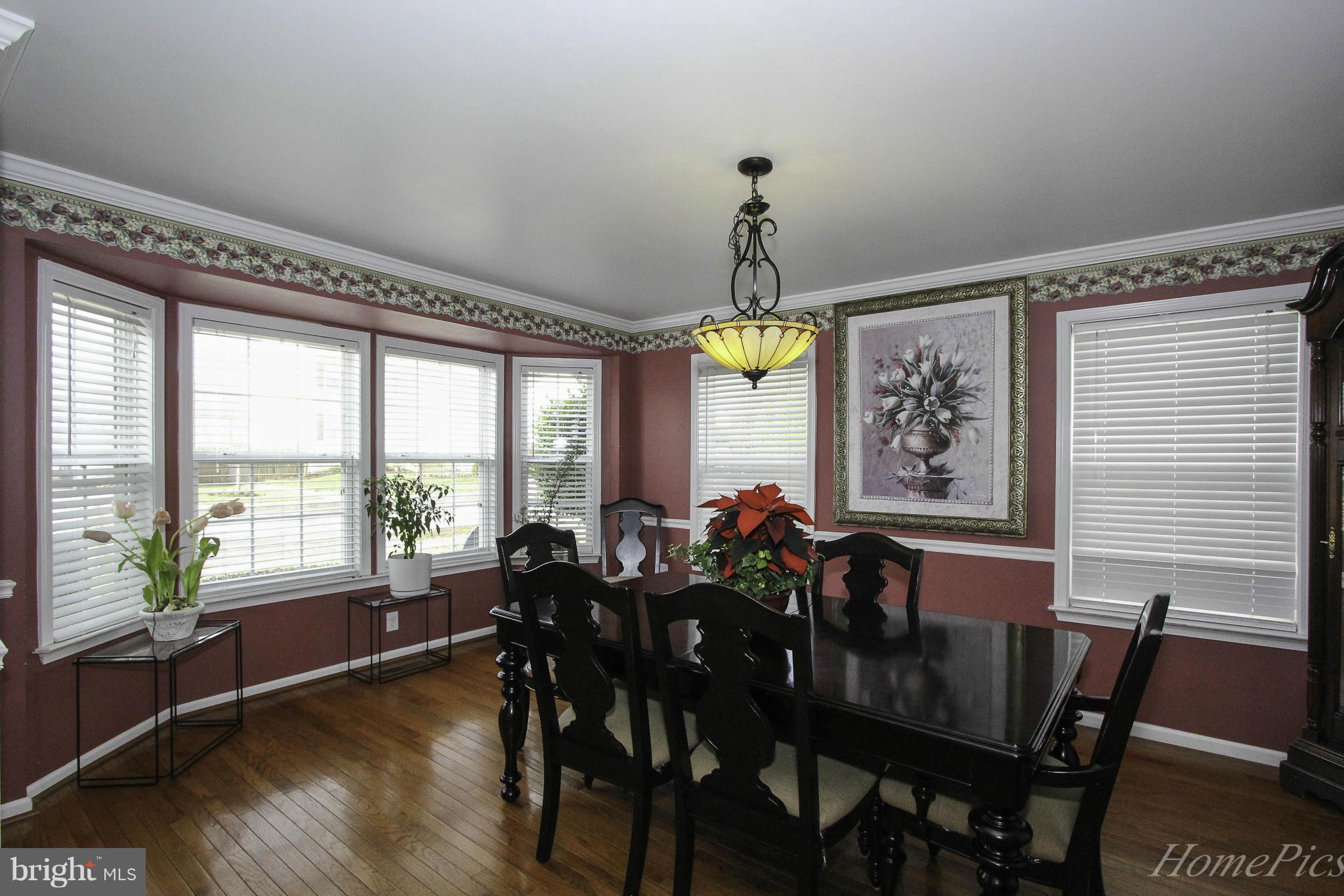 109 Limited Drive Ranson, WV 25438 - Photo 7 of 29 a view of a dining room with furniture window and outside view