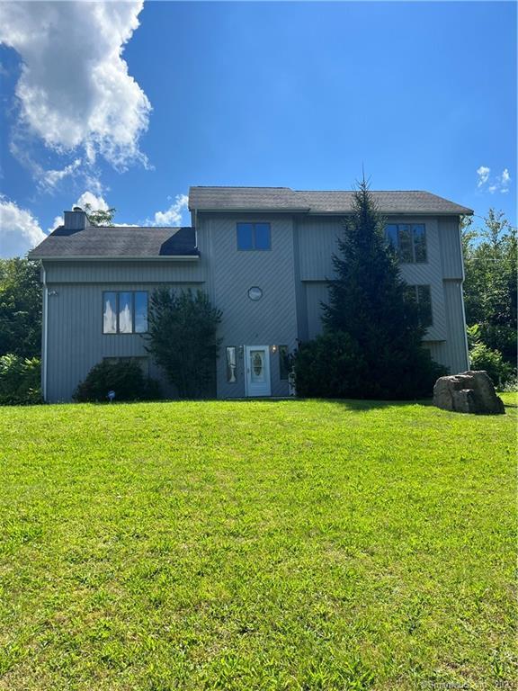15 Patten Road North Haven, CT 06473 - Photo 1 of 1 a front view of a house with a yard and garage