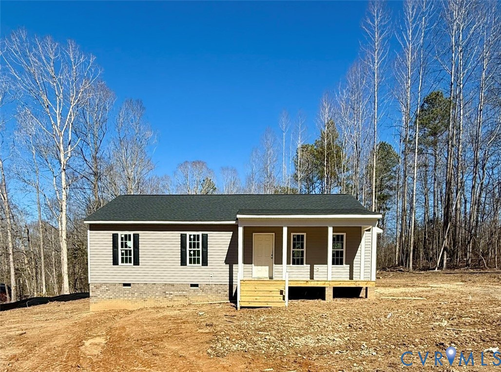 5081 Nomini Hall Road Hague, VA 22469 - Photo 1 of 22 a front view of a house with a yard