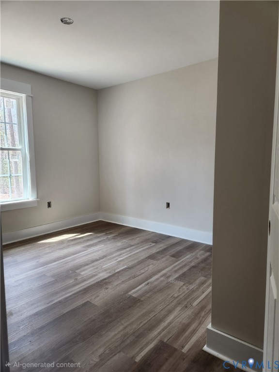 5081 Nomini Hall Road Hague, VA 22469 - Photo 18 of 21 an empty room with wooden floor and windows