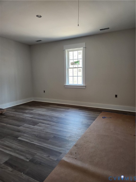 5081 Nomini Hall Road Hague, VA 22469 - Photo 19 of 21 an empty room with wooden floor