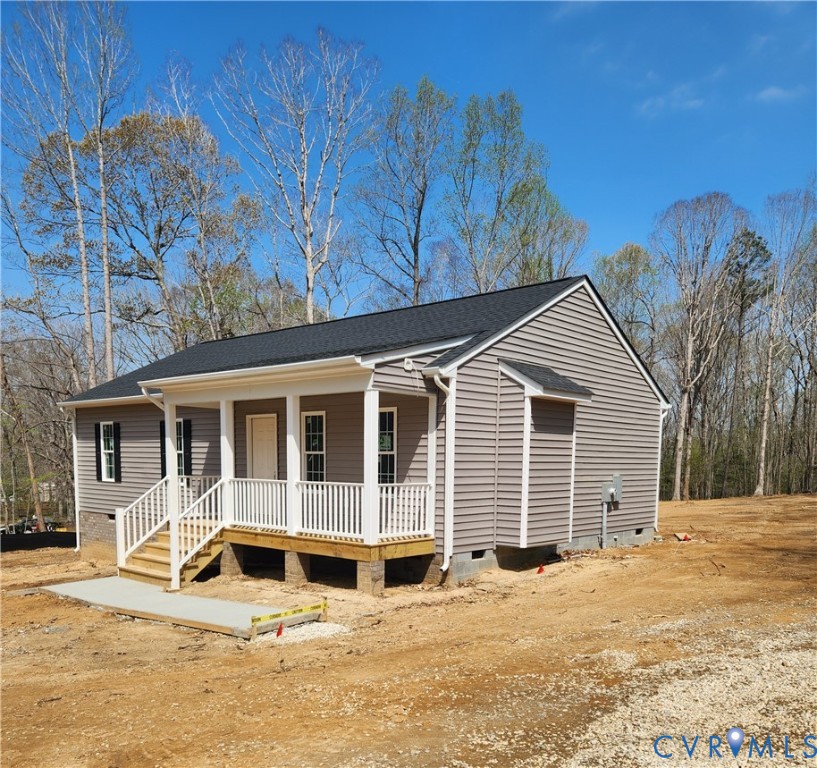 5081 Nomini Hall Road Hague, VA 22469 - Photo 2 of 21 a view of a house with snow on the wall
