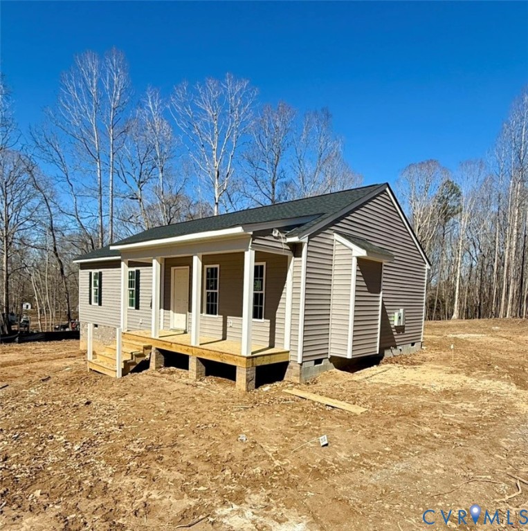 5081 Nomini Hall Road Hague, VA 22469 - Photo 2 of 22 a front view of a house with a yard