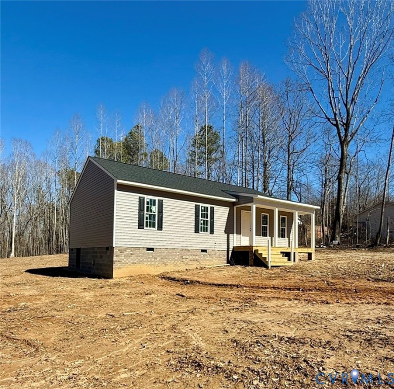 5081 Nomini Hall Road Hague, VA 22469 - Photo 3 of 22 a front view of a house with a yard