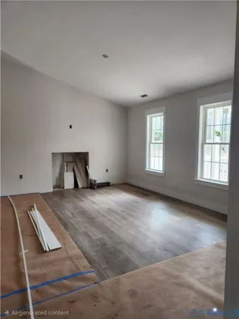 a spacious bedroom with a bed and window
