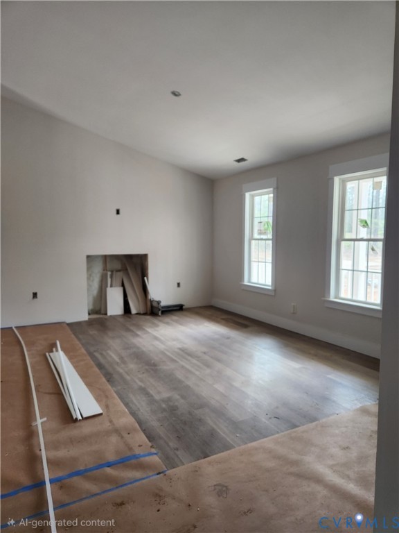 5081 Nomini Hall Road Hague, VA 22469 - Photo 8 of 21 a spacious bedroom with a bed and window