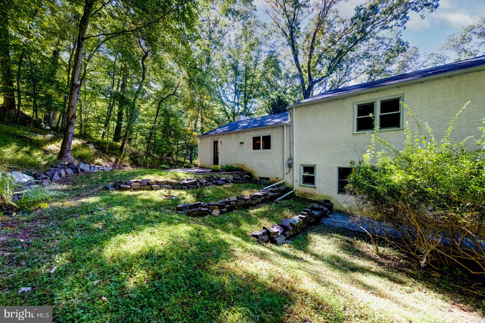5 Walnut Lane Berwyn, PA 19312 - Photo 29 of 30 a backyard of a house with barbeque oven table and chairs