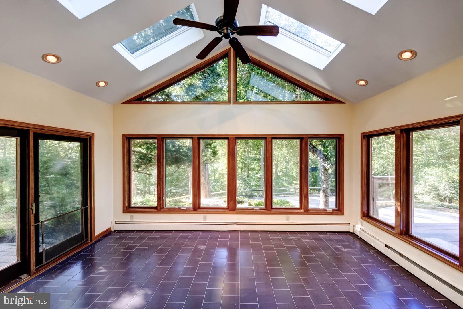 5 Walnut Lane Berwyn, PA 19312 - Photo 8 of 30 a view of an empty room with wooden floor and a window