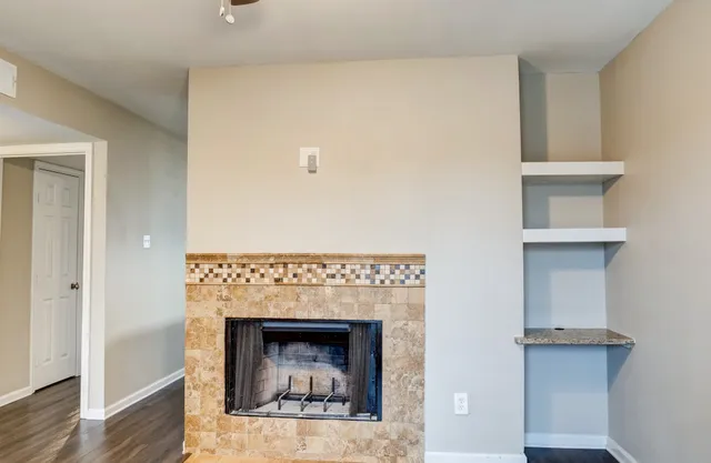 a living room with a fireplace