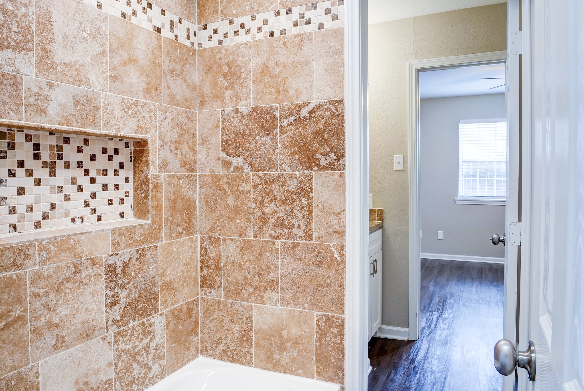 9020 Grannis Street, Unit 4 Houston, TX 77075 - Photo 5 of 8 a bathroom with a shower