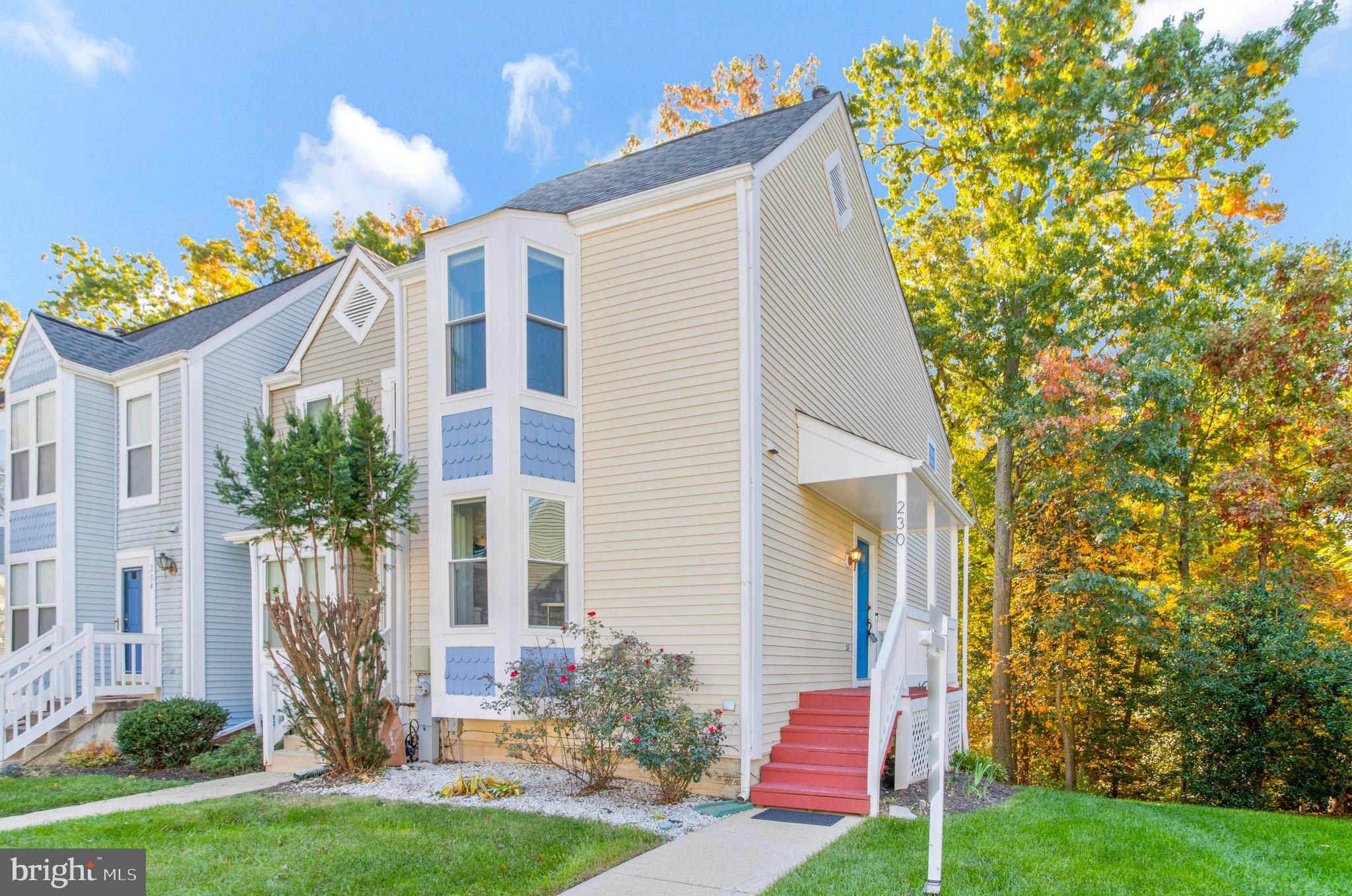 End unit next to common area and beautiful trees.