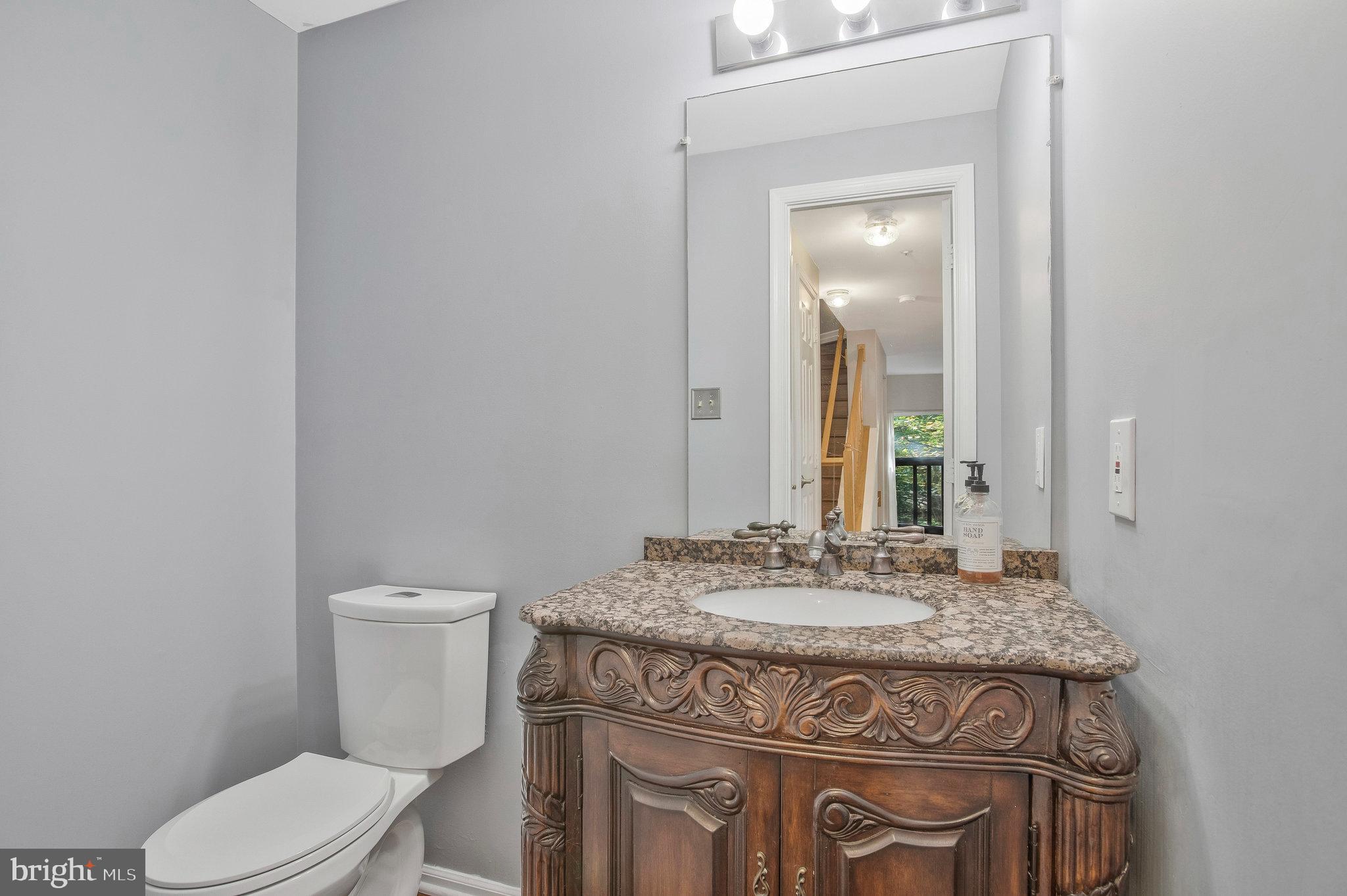 230 Sycamore Ridge Road Laurel, MD 20724 - Photo 13 of 32 Half bath on main level is upadated.