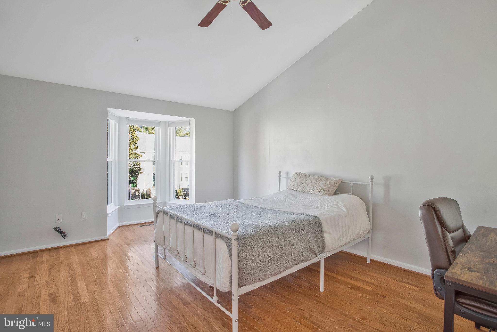 230 Sycamore Ridge Road Laurel, MD 20724 - Photo 16 of 32 Primary bedroom with hardwood and bay window.
