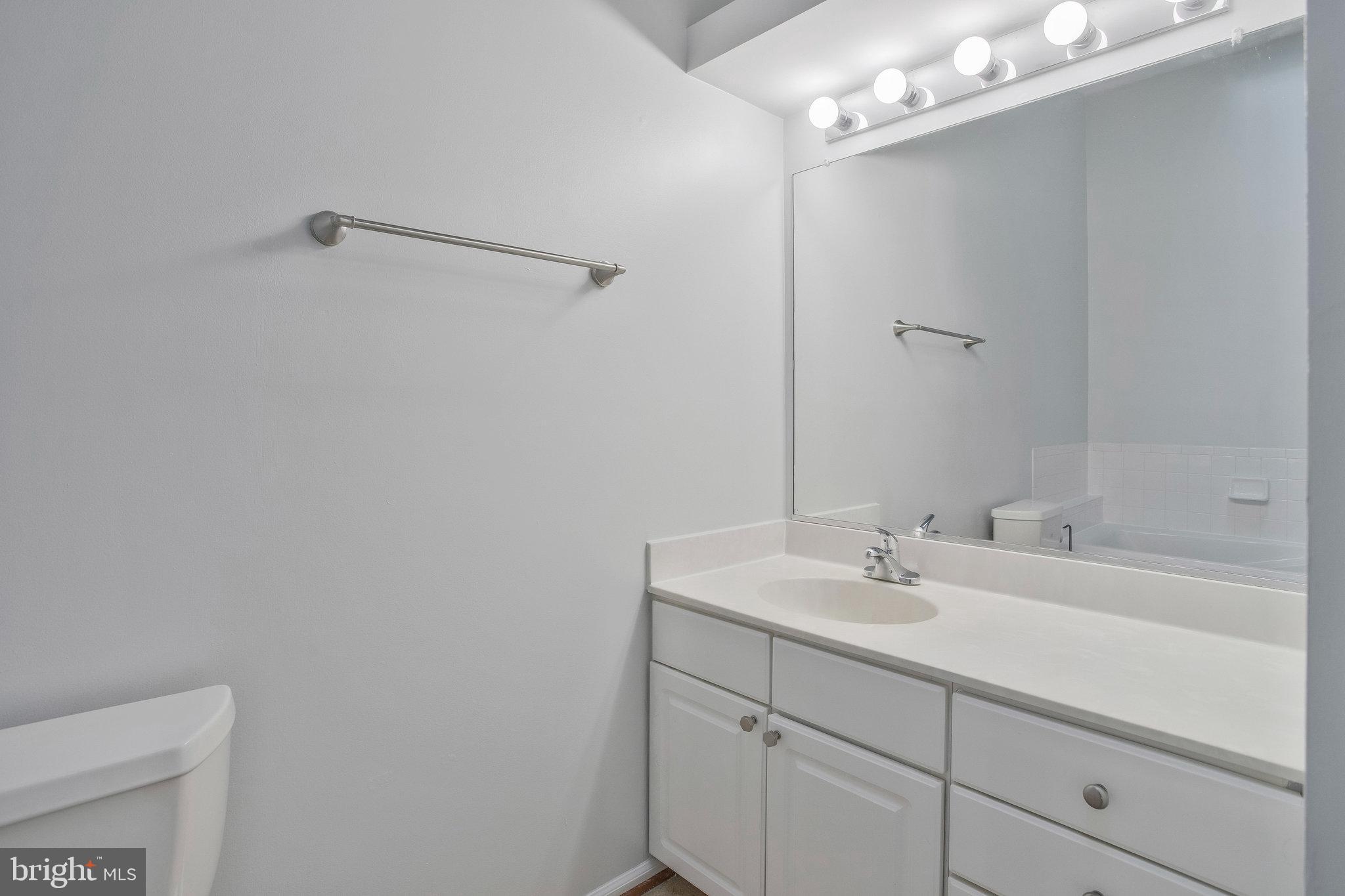 230 Sycamore Ridge Road Laurel, MD 20724 - Photo 19 of 32 Bedroom level full bath with spacious vanity.