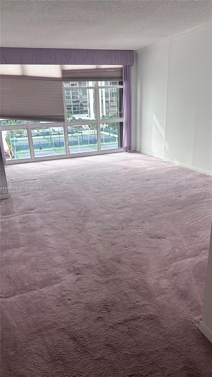 1865 Brickell Avenue, Unit A709 Miami, FL 33129 - Photo 17 of 19 a view of empty room with front door