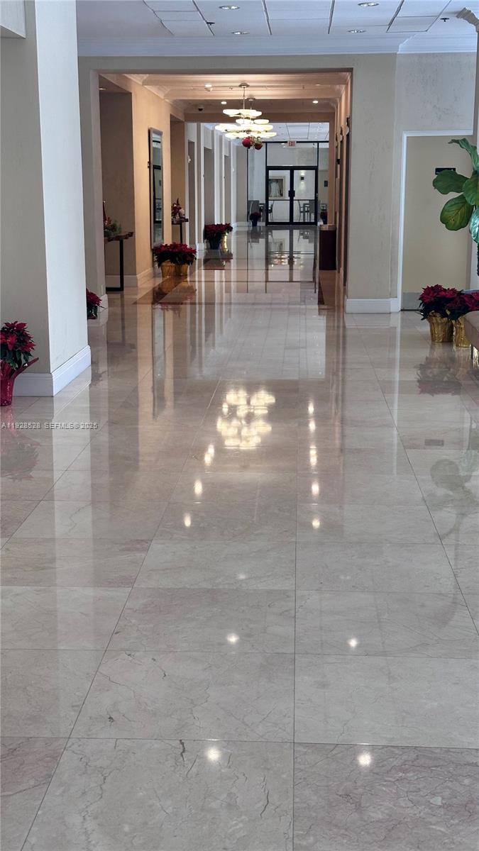 1865 Brickell Avenue, Unit A709 Miami, FL 33129 - Photo 2 of 19 a lobby with furniture and dining room view