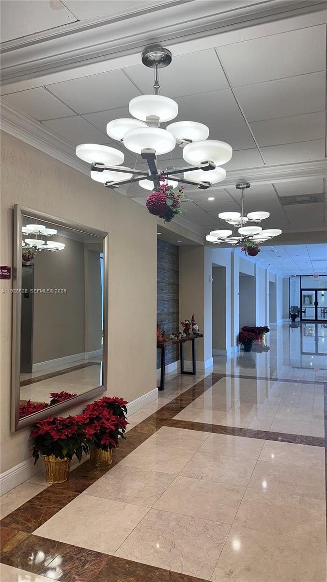 1865 Brickell Avenue, Unit A709 Miami, FL 33129 - Photo 3 of 19 a view of a room with gym equipment